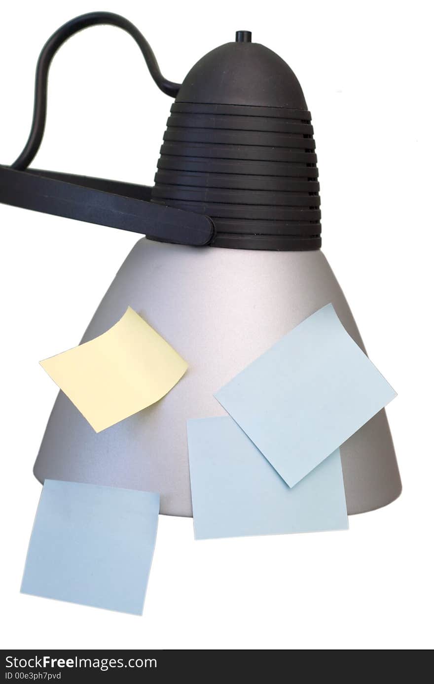 Sticky papers on the reading lamp