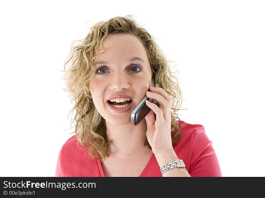 Attractive blonde with a mbile phone isolated on white. Attractive blonde with a mbile phone isolated on white