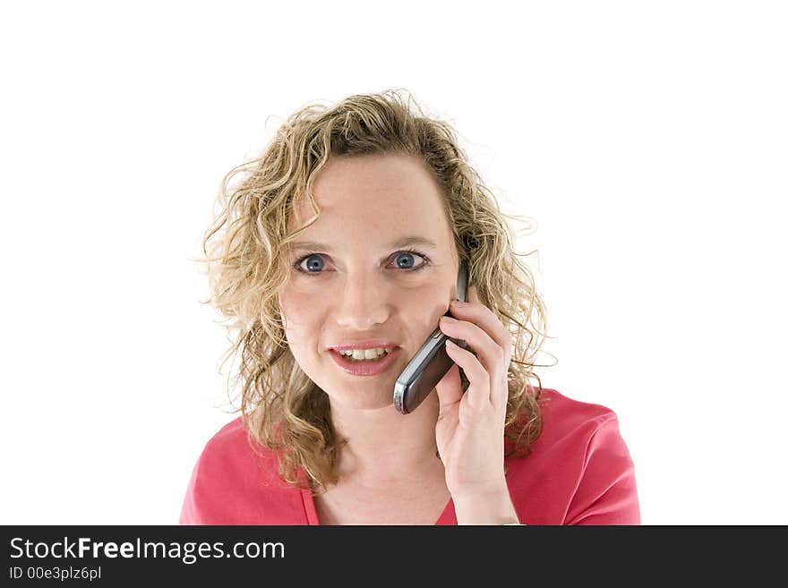 Attractive blonde with a mbile phone isolated on white. Attractive blonde with a mbile phone isolated on white