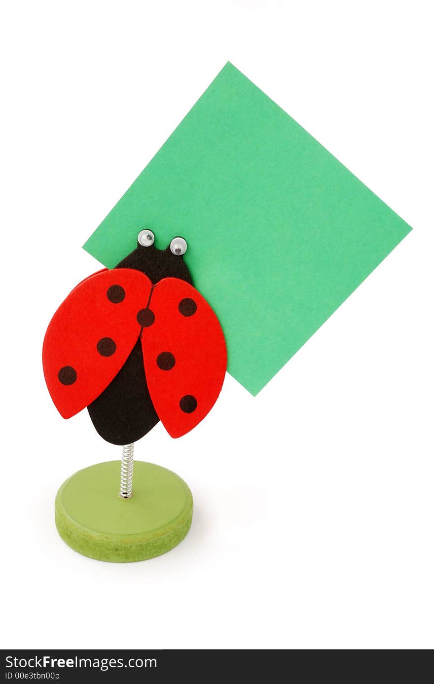 Ladybird memo-holder on white