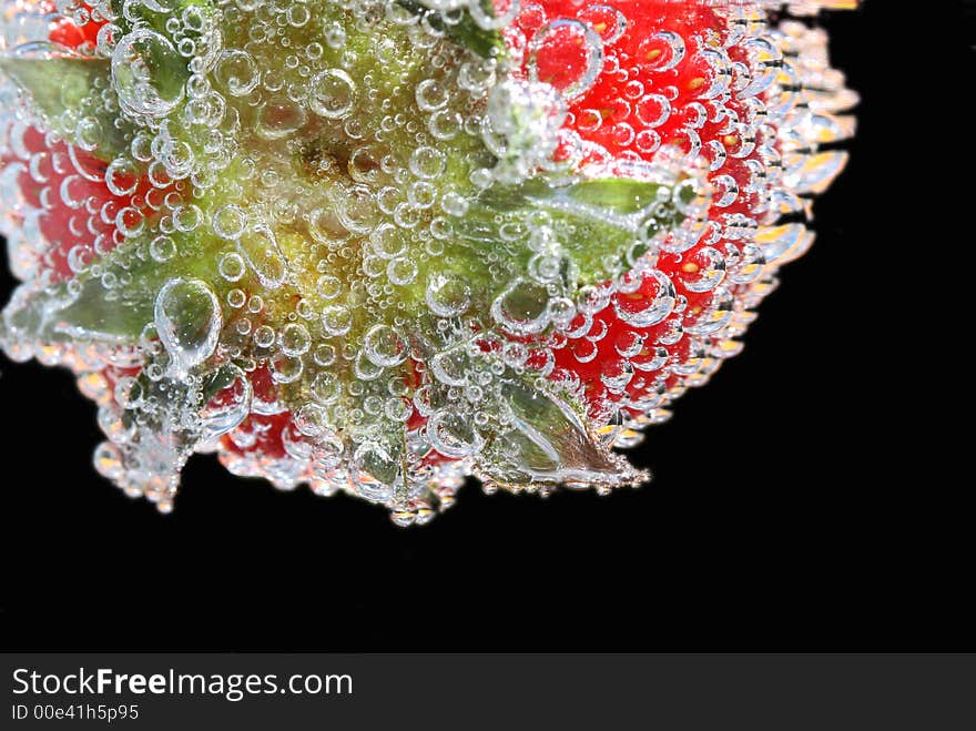 Strawberry with bubbles with black background