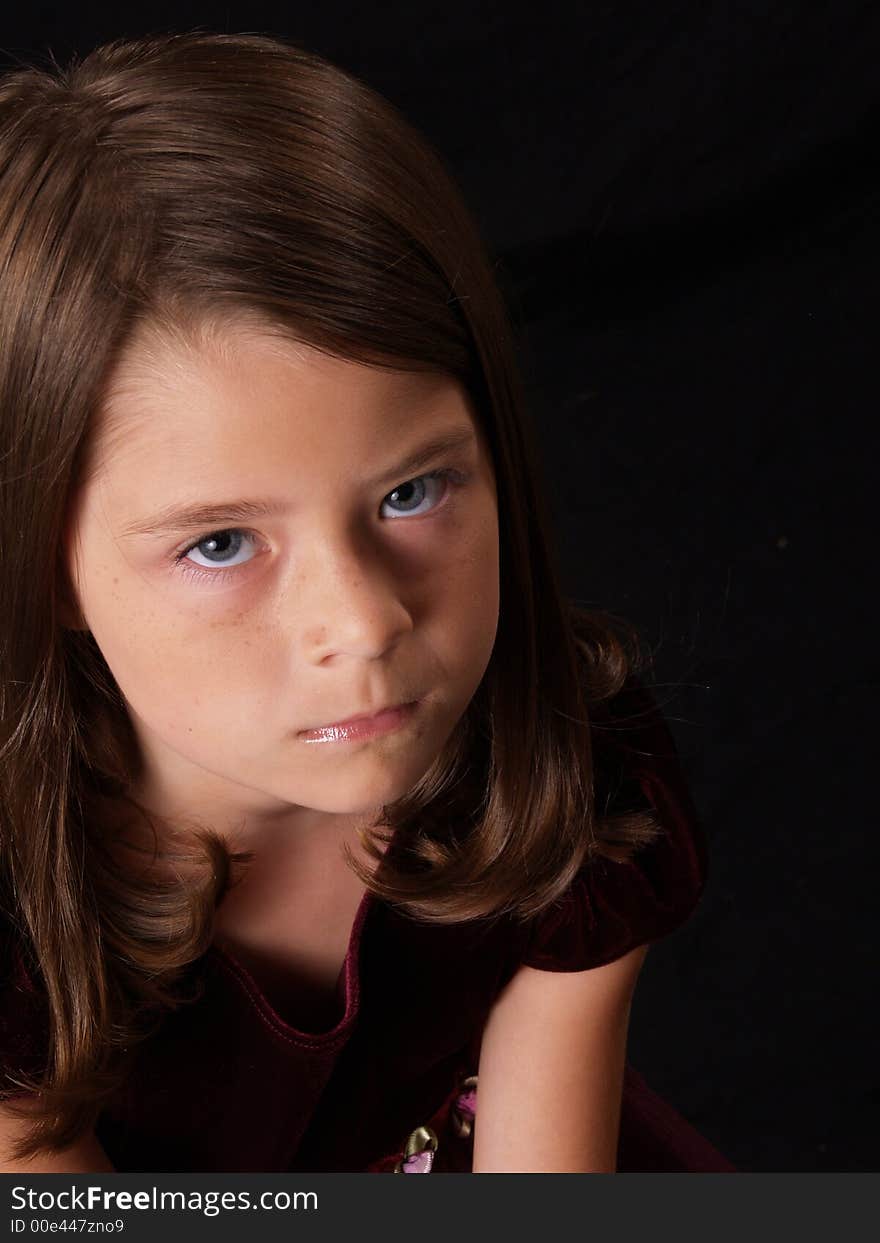 Brunette Little Girl on Black