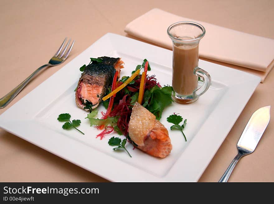 Roasted salmon with sauce and seaweed