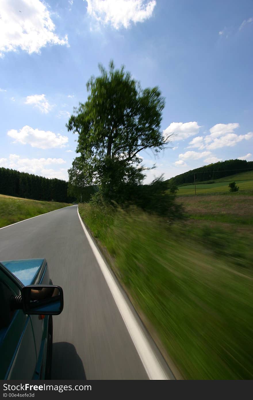 Diving in our car through hilly lands with full speed. Diving in our car through hilly lands with full speed