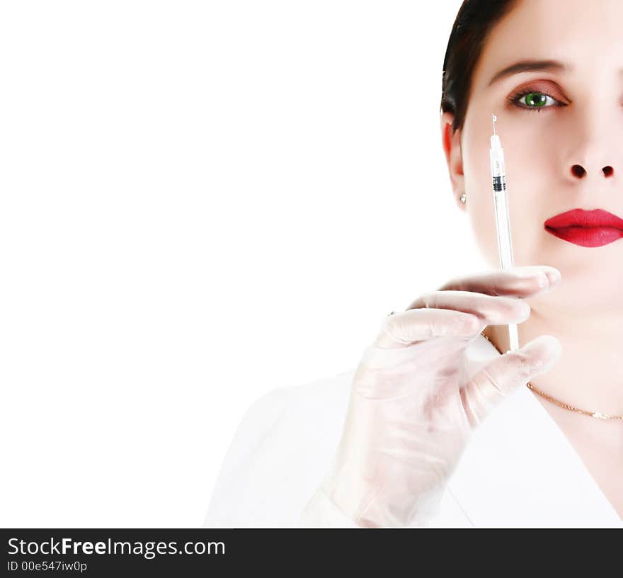 High key portrait of female with syringe. High key portrait of female with syringe