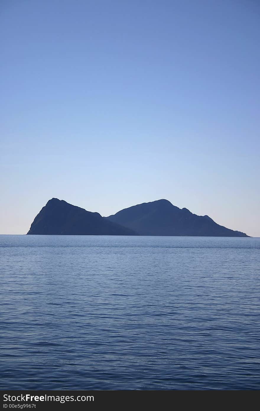 Mountain peaks in Waters of Neah Bay near Seward Alaska. Mountain peaks in Waters of Neah Bay near Seward Alaska