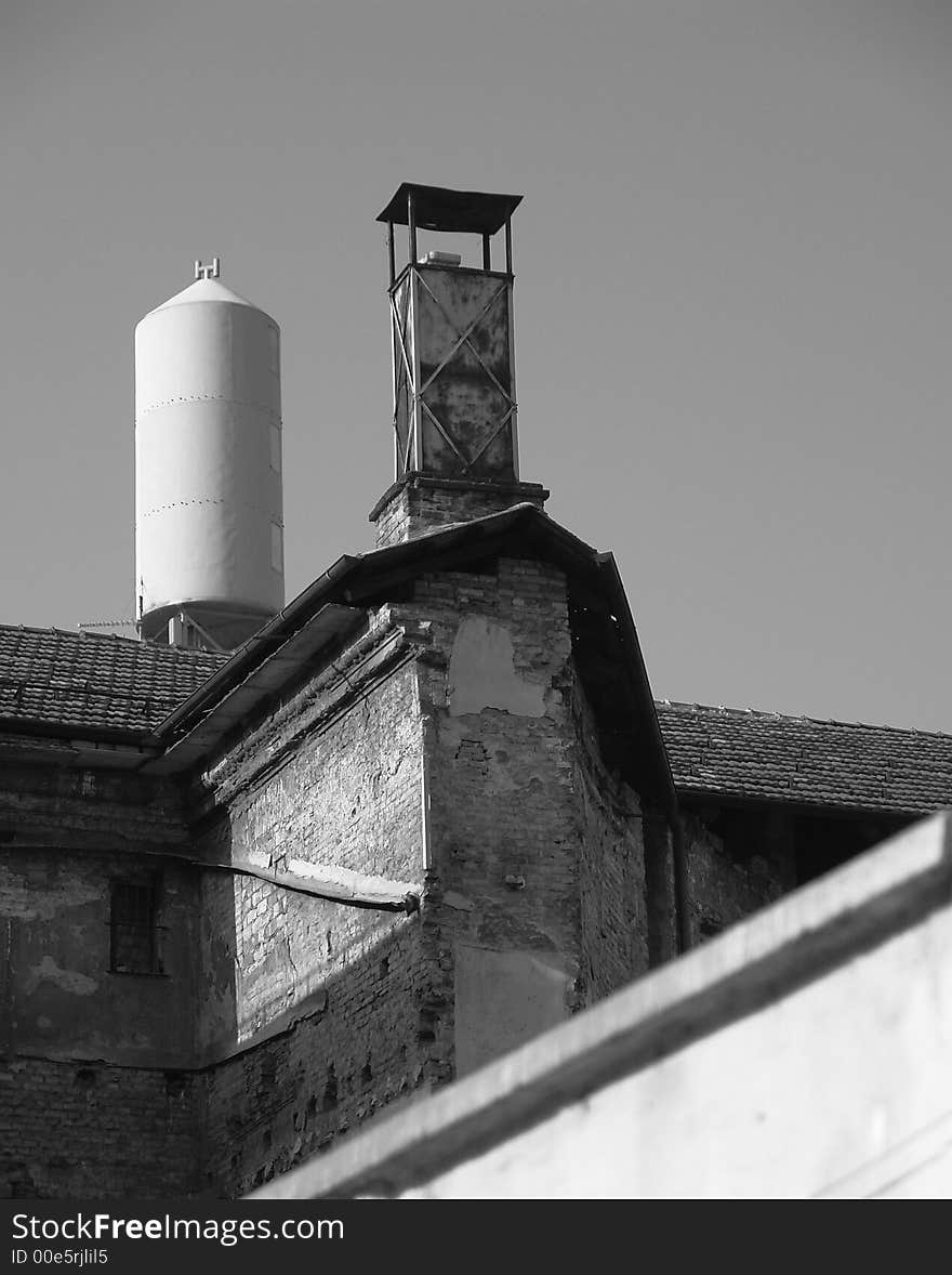 a water container on the roof of a building