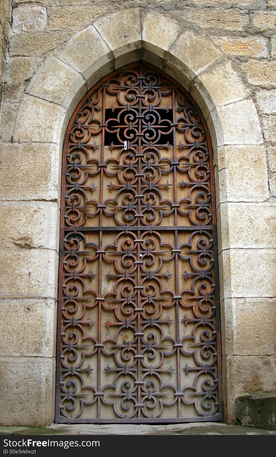 Photograph of a Gothic style Medieval door in France. Photograph of a Gothic style Medieval door in France.