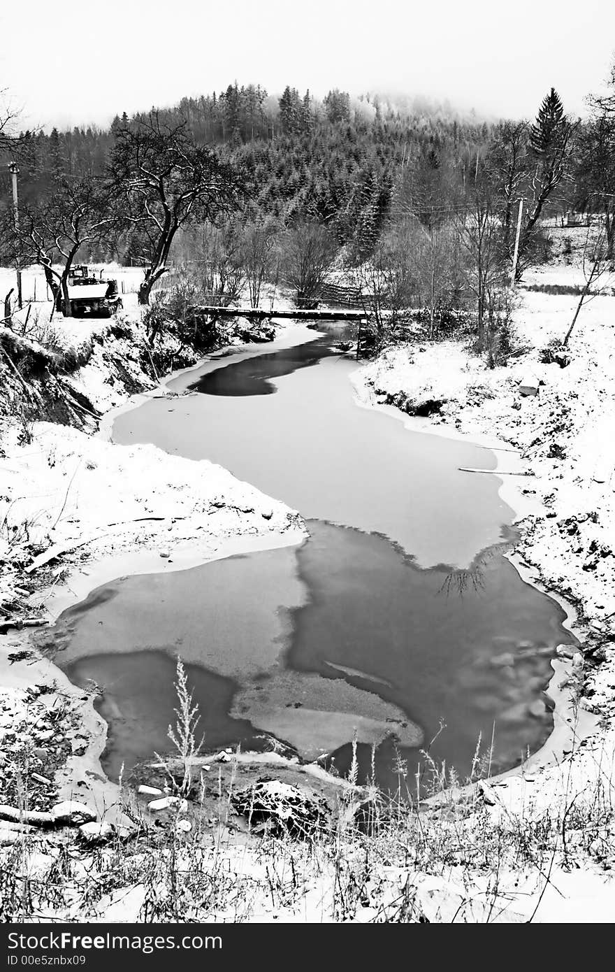 Small country river in mountains of Ukraine