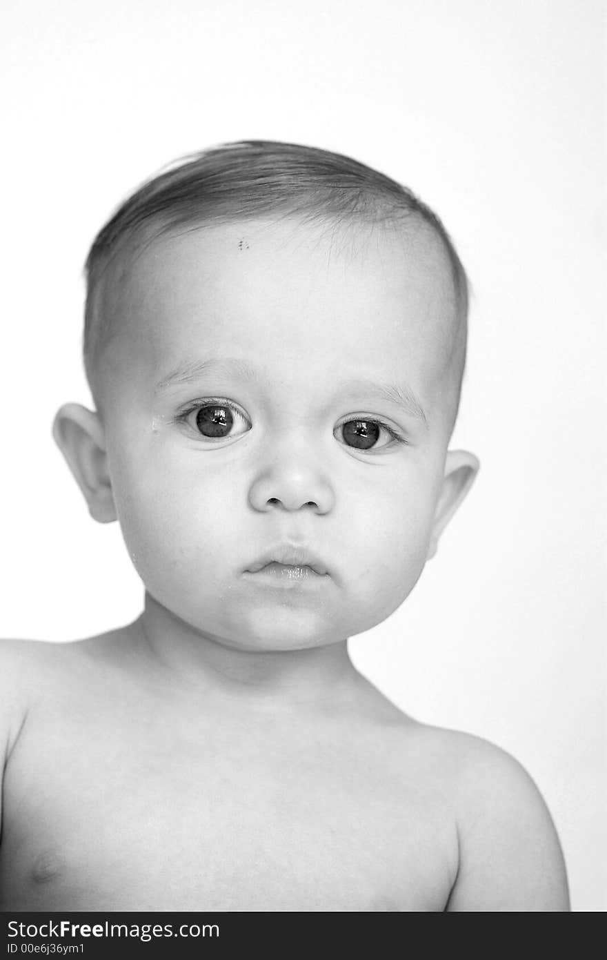 Black and white image of beautiful 10 month old baby boy. Black and white image of beautiful 10 month old baby boy