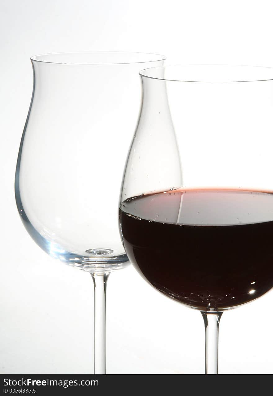 Two wine glasses with red wine