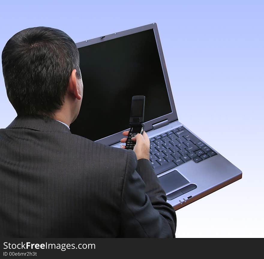 Businessman configuring the network in the office