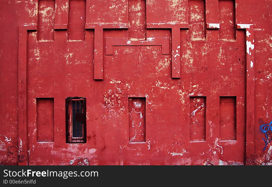 Old red wall with winow