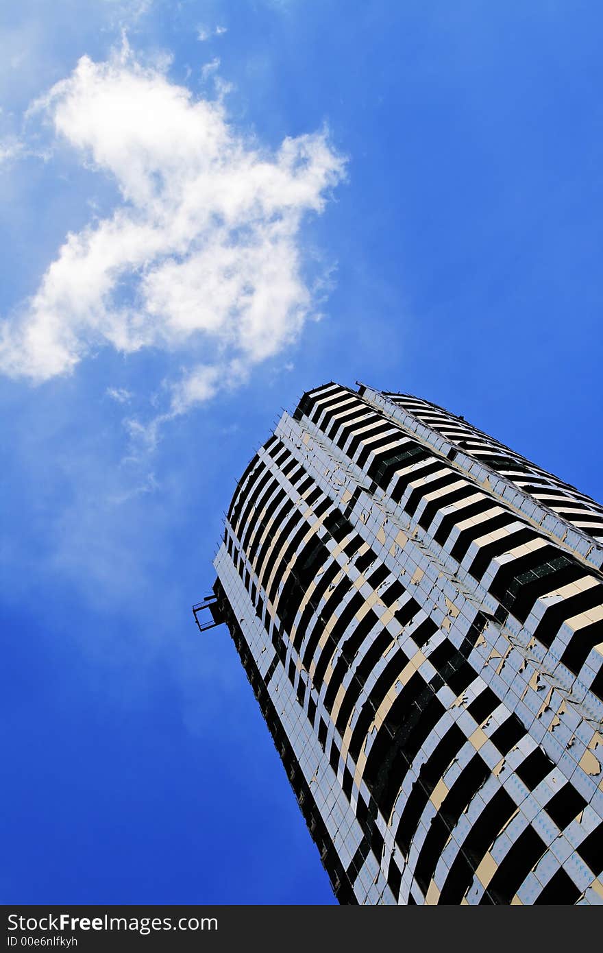 Skyscraper in the blue sky with cloud. Skyscraper in the blue sky with cloud.