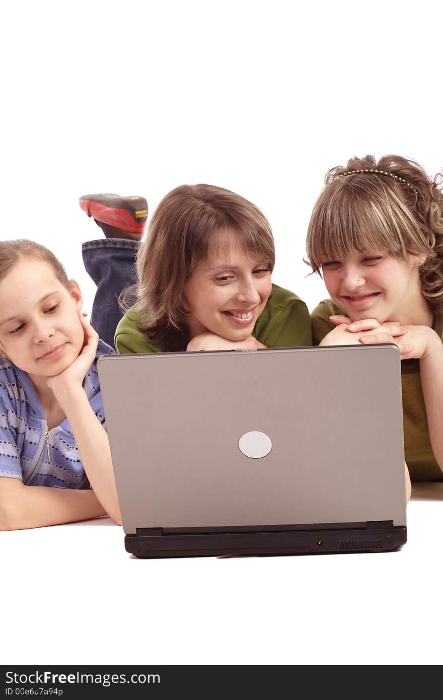 Girls with a laptop. Shot in studio. Girls with a laptop. Shot in studio.