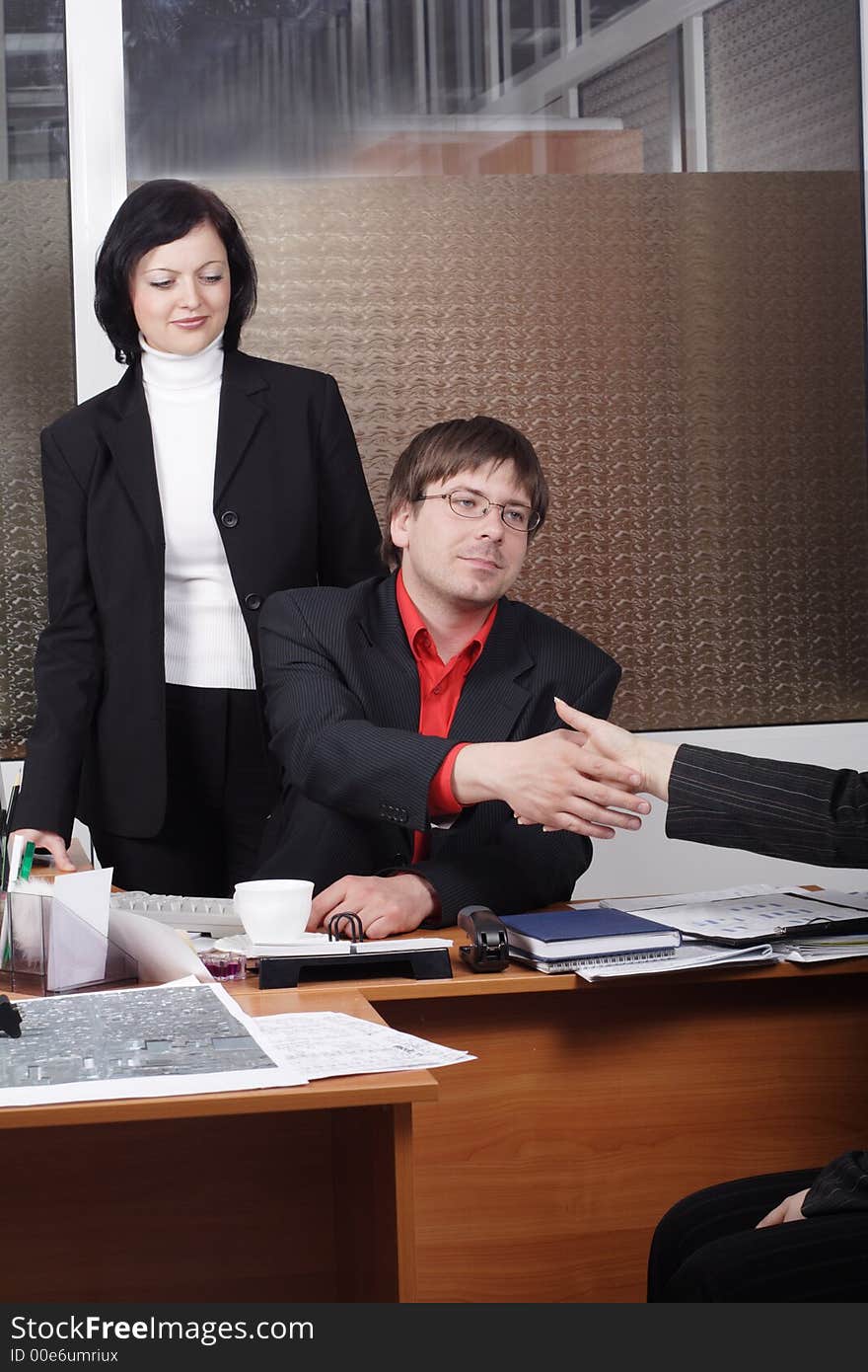 Group of 2 business people working together in the office. Group of 2 business people working together in the office.