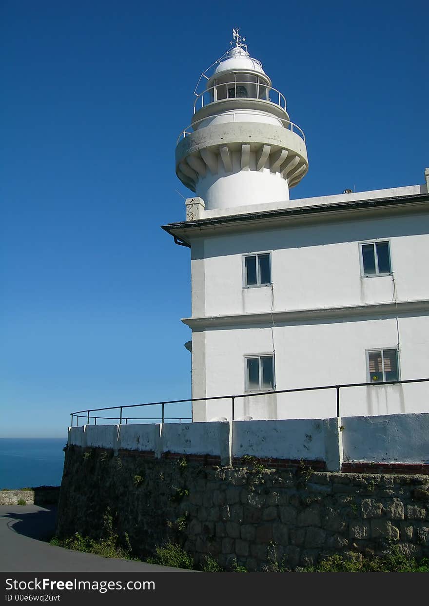 White old lighthouse in the coast