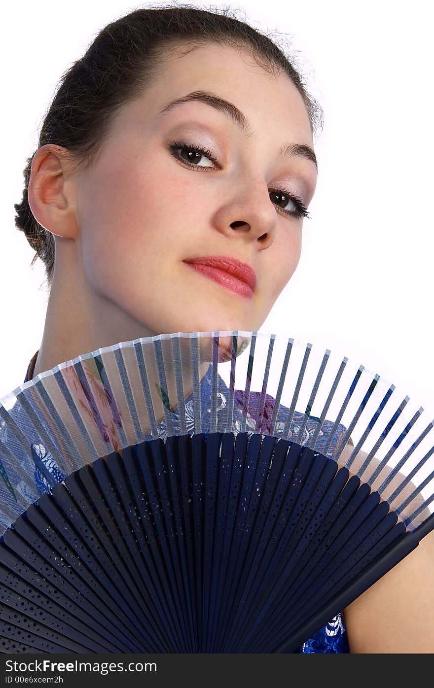 White girl with fan on the white background