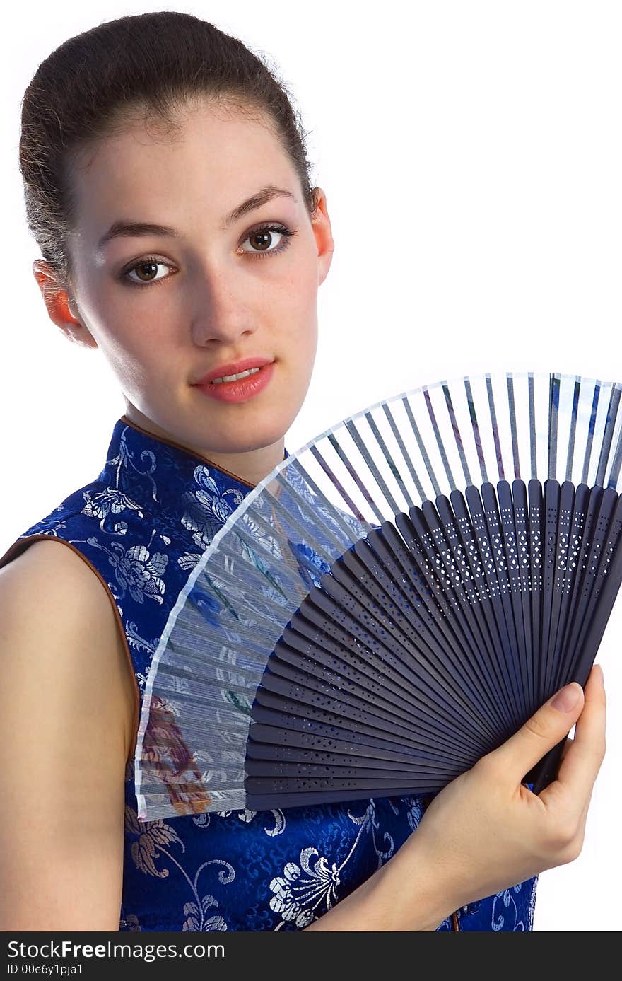 White girl with fan on the white background. White girl with fan on the white background