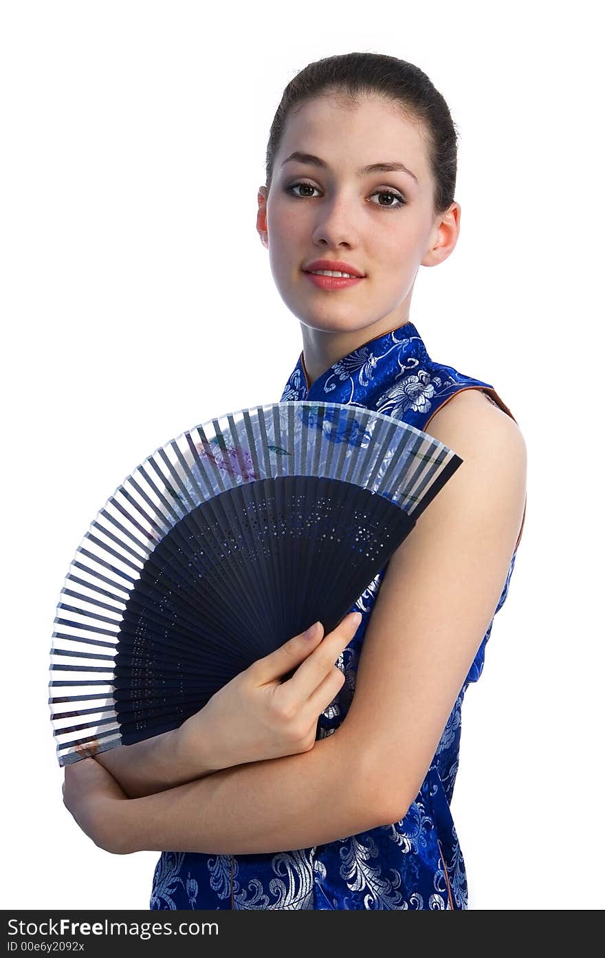 White girl with fan on the white background. White girl with fan on the white background