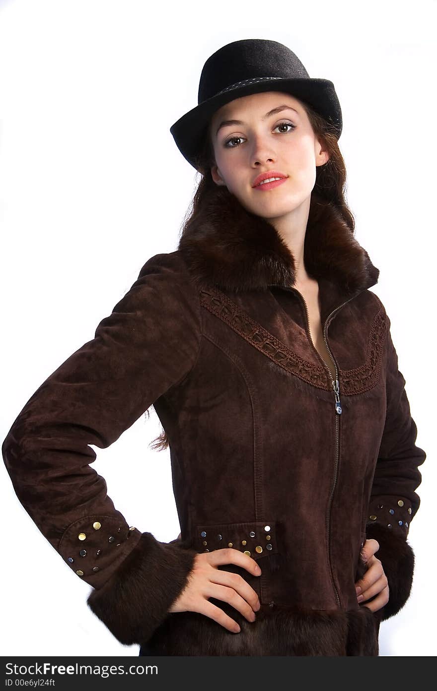 White girl with jacket and hat on the white background. White girl with jacket and hat on the white background