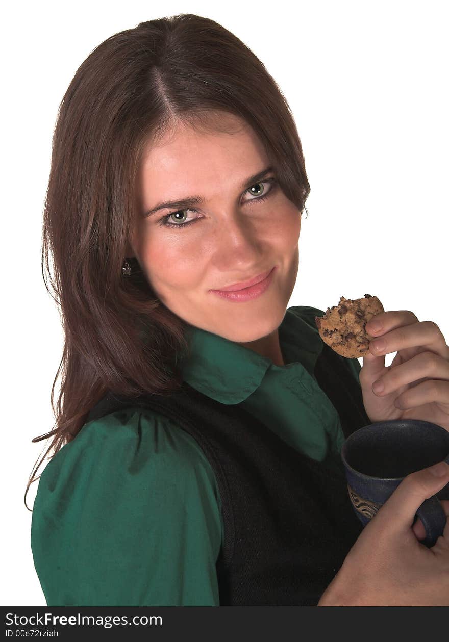 Professional young white lady looking at me eating a biscuit green shirt. White isolated back ground. Black jacket. Professional young white lady looking at me eating a biscuit green shirt. White isolated back ground. Black jacket