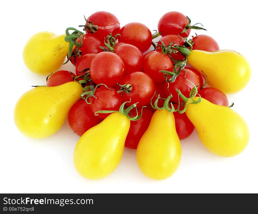 Red and yellow cherry tomatoes - isolated on white background. Red and yellow cherry tomatoes - isolated on white background