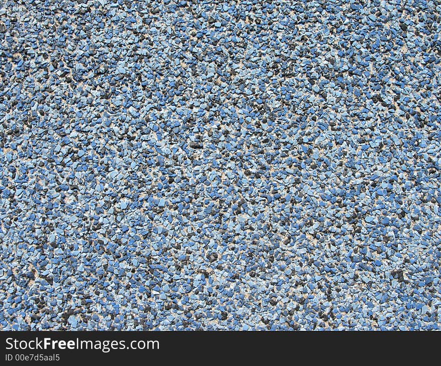 Blue pebbled pavement in playground. Blue pebbled pavement in playground