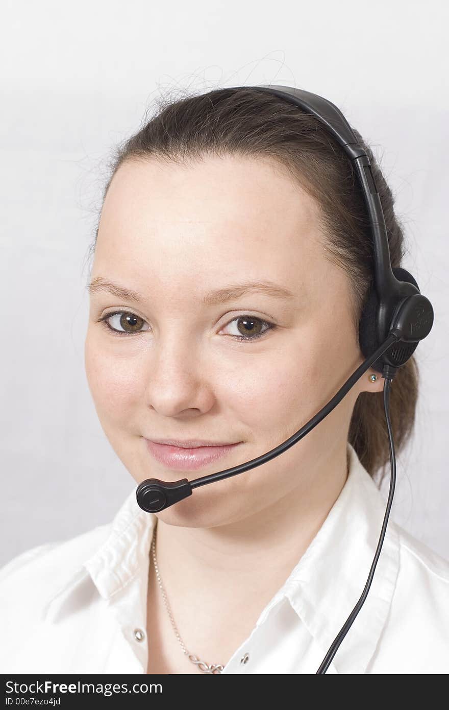 Smiling girl with headset