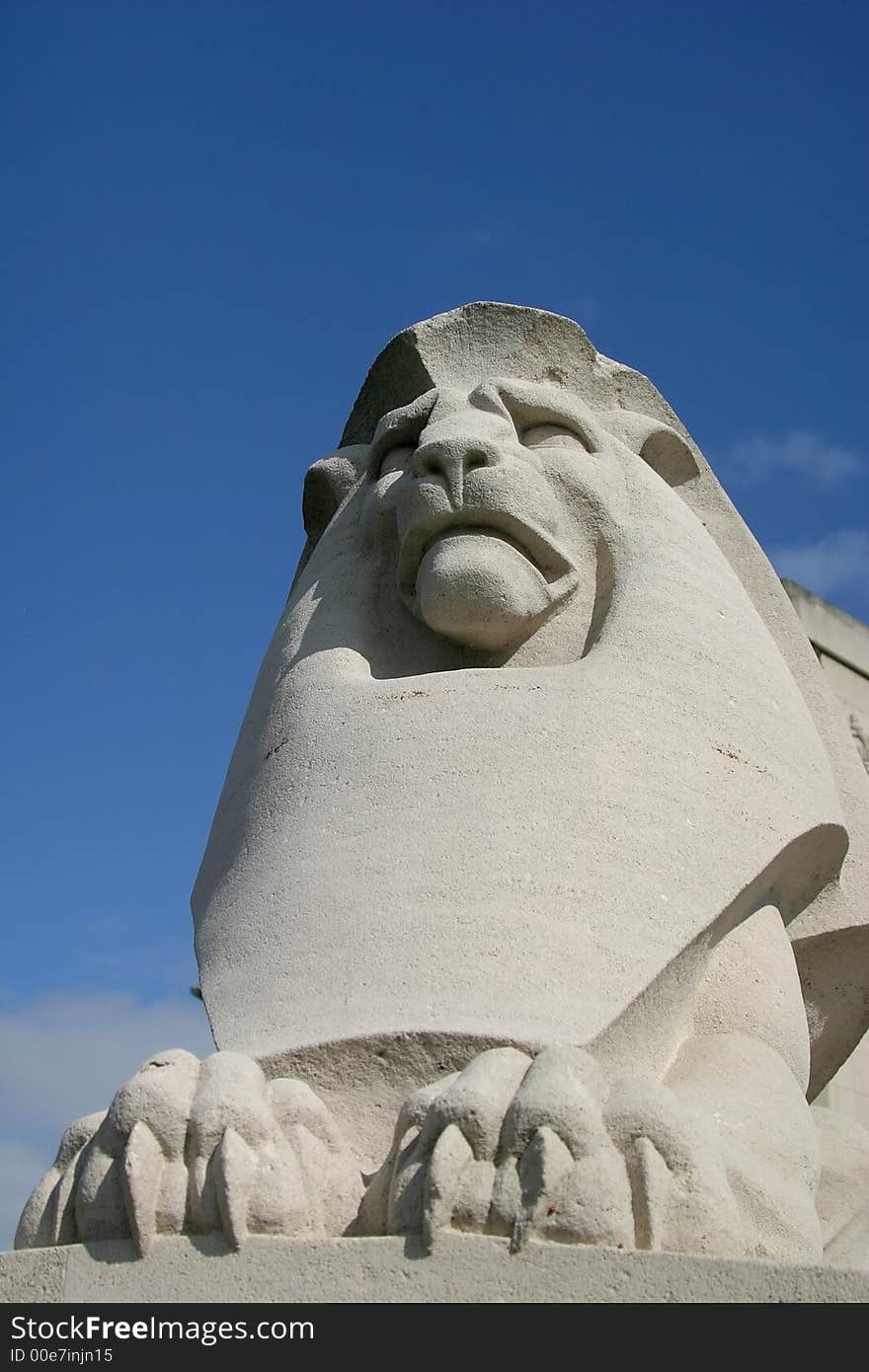 A lion sculpture against a blue sky in Nieuwpoort (Belgian). A lion sculpture against a blue sky in Nieuwpoort (Belgian).