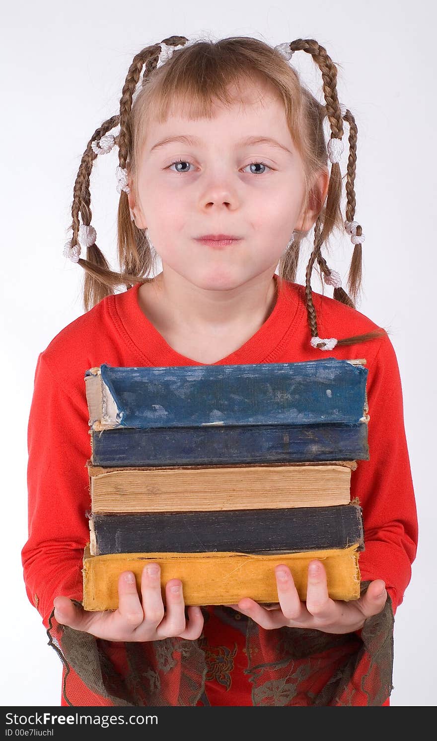 The girl with old books on a white background. The girl with old books on a white background