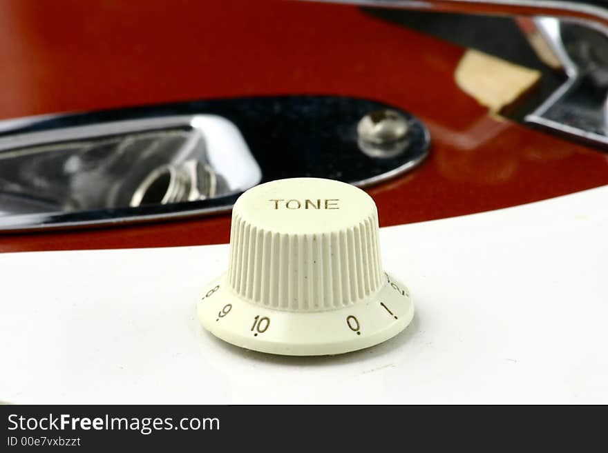 Close up at tone pot of electric guitar