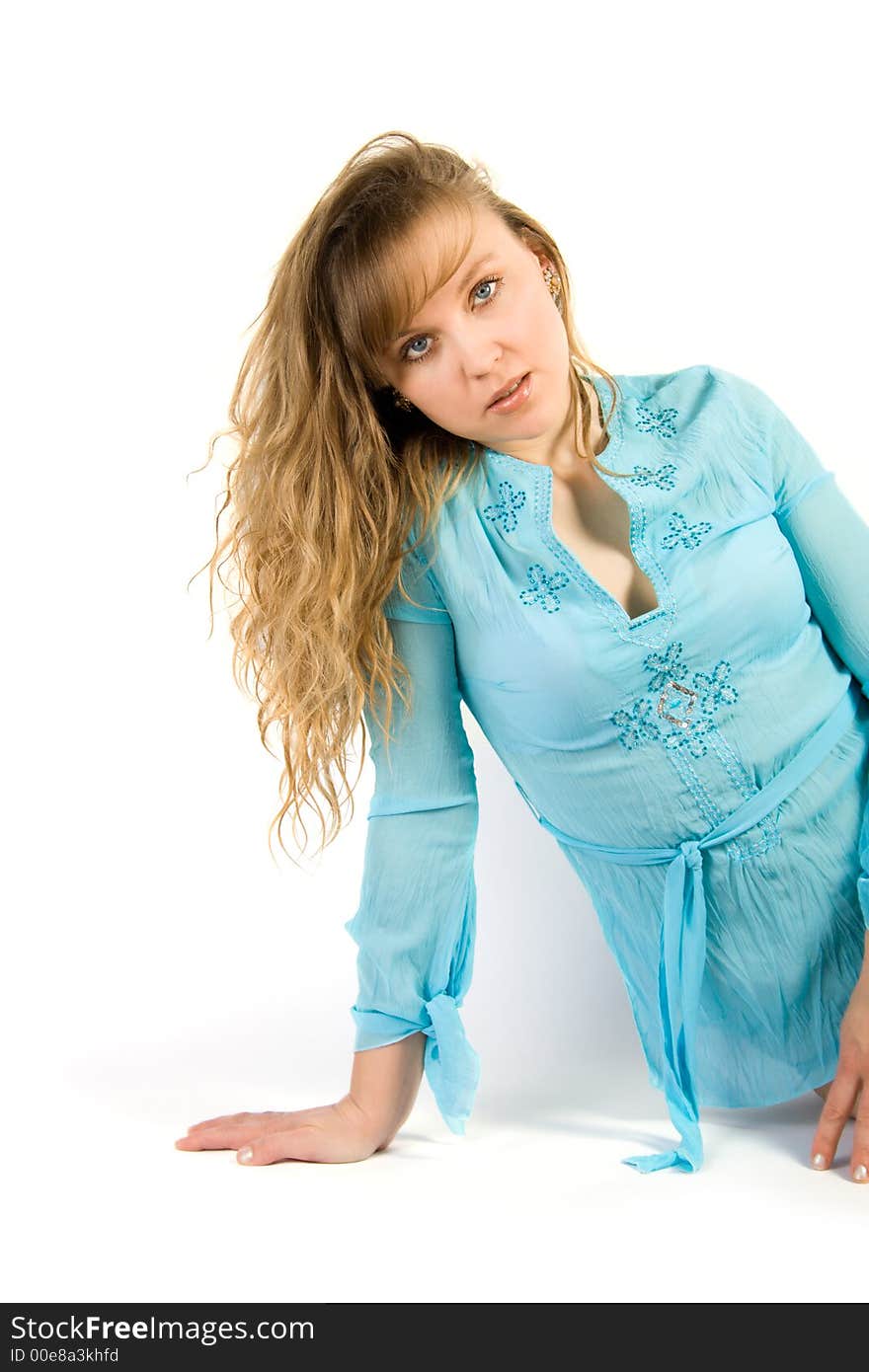 Pretty young women in blue isolated over white