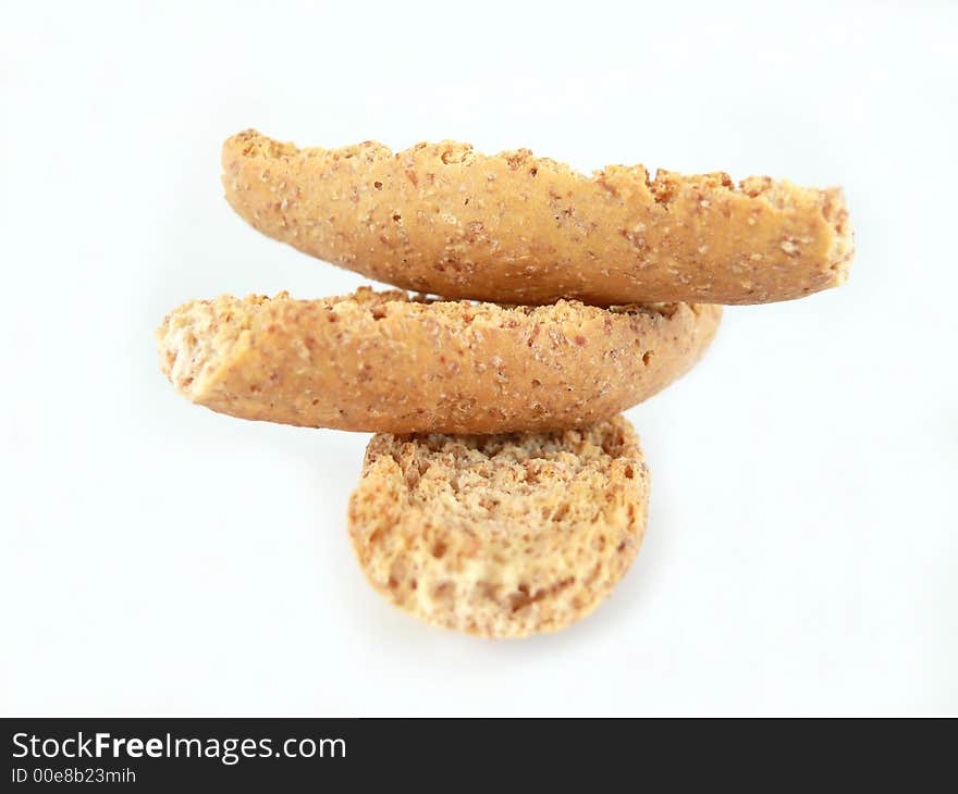 Crispy bread on white background