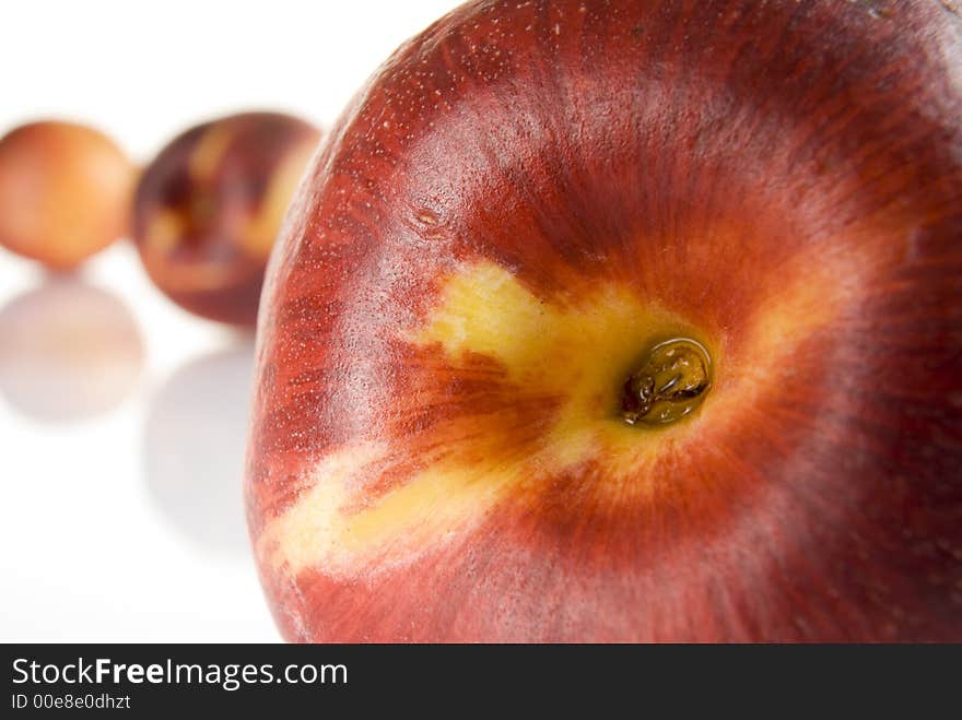 Fresh colored peaches close up