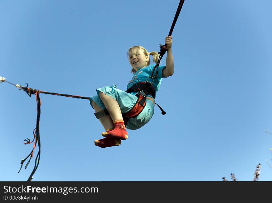 Jumping Girl (trampoline at the funfair)