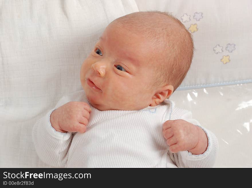 Newborn child on white background. Newborn child on white background