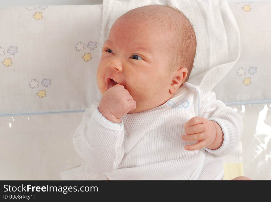 Newborn child on white background. Newborn child on white background