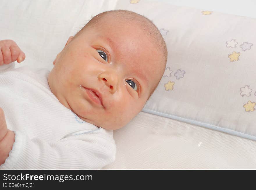 Newborn child on white background. Newborn child on white background