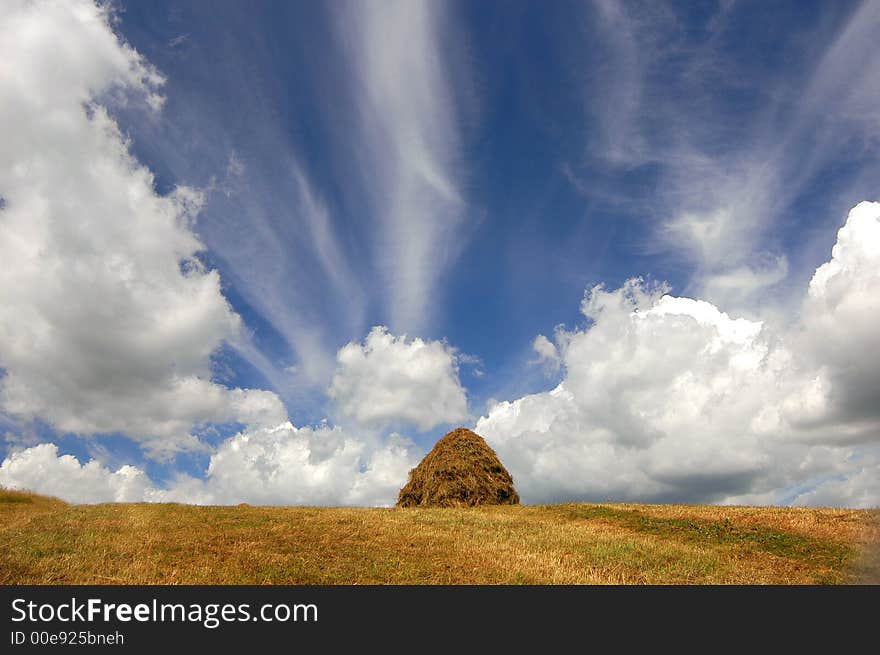 Rural landscape with cumulus clouds