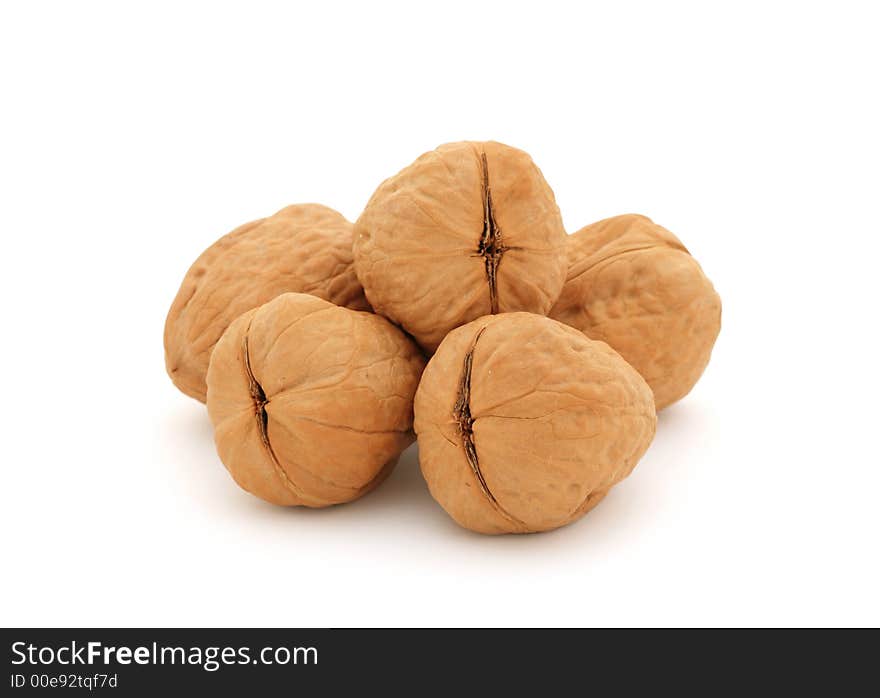 Five walnuts over white background (clipping path included). Five walnuts over white background (clipping path included)