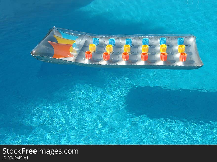 Colorful bed in the swimming pool