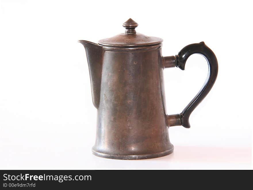 Old silver coffeepot on a white background