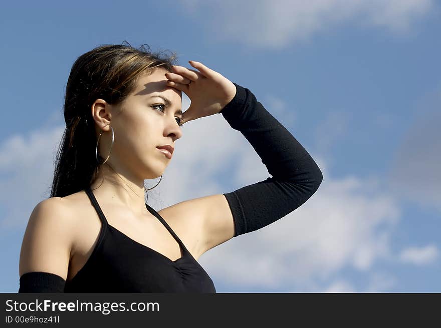 Attractive young businesswoman facing the future