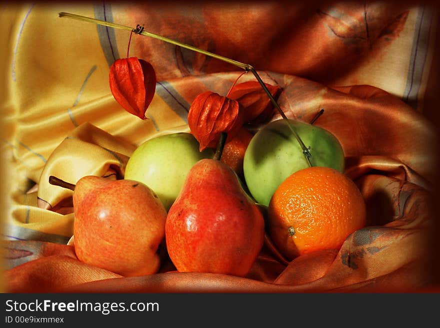 Fruit composition on a colorful material. Fruit composition on a colorful material