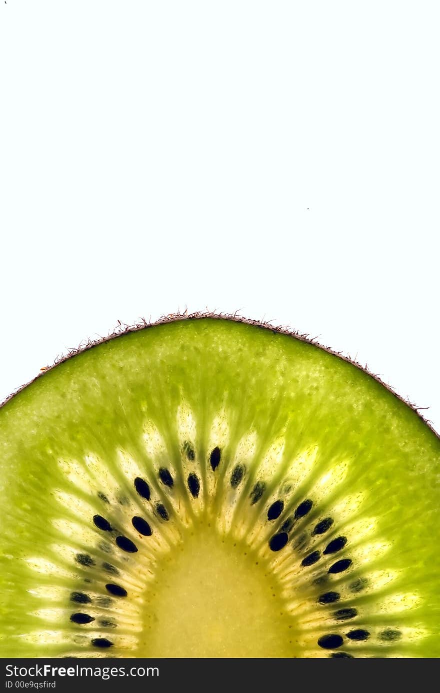 Lushes green slice of a kiwi isolated on white background