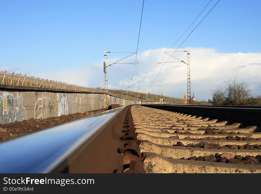 A track of a railway with blue sky