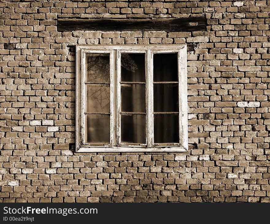 A detail of an old brick house. A detail of an old brick house