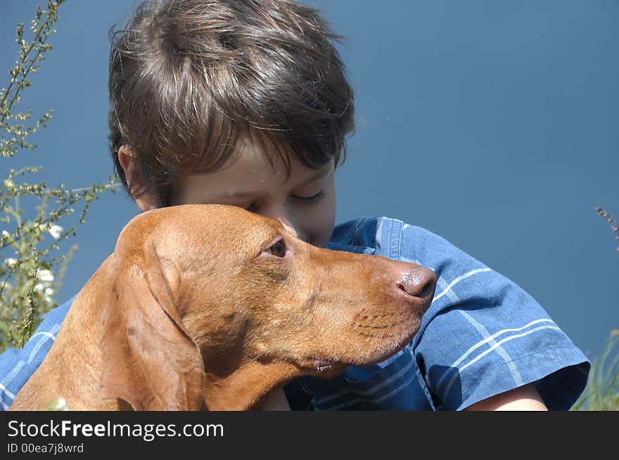 Young Boy With A Dog