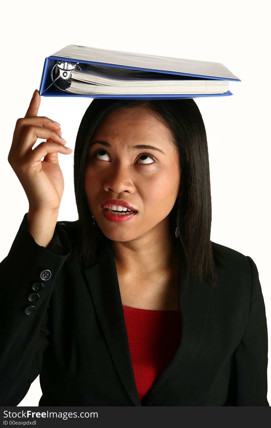 Beautiful chinese indonesian business woman balancing book on head.